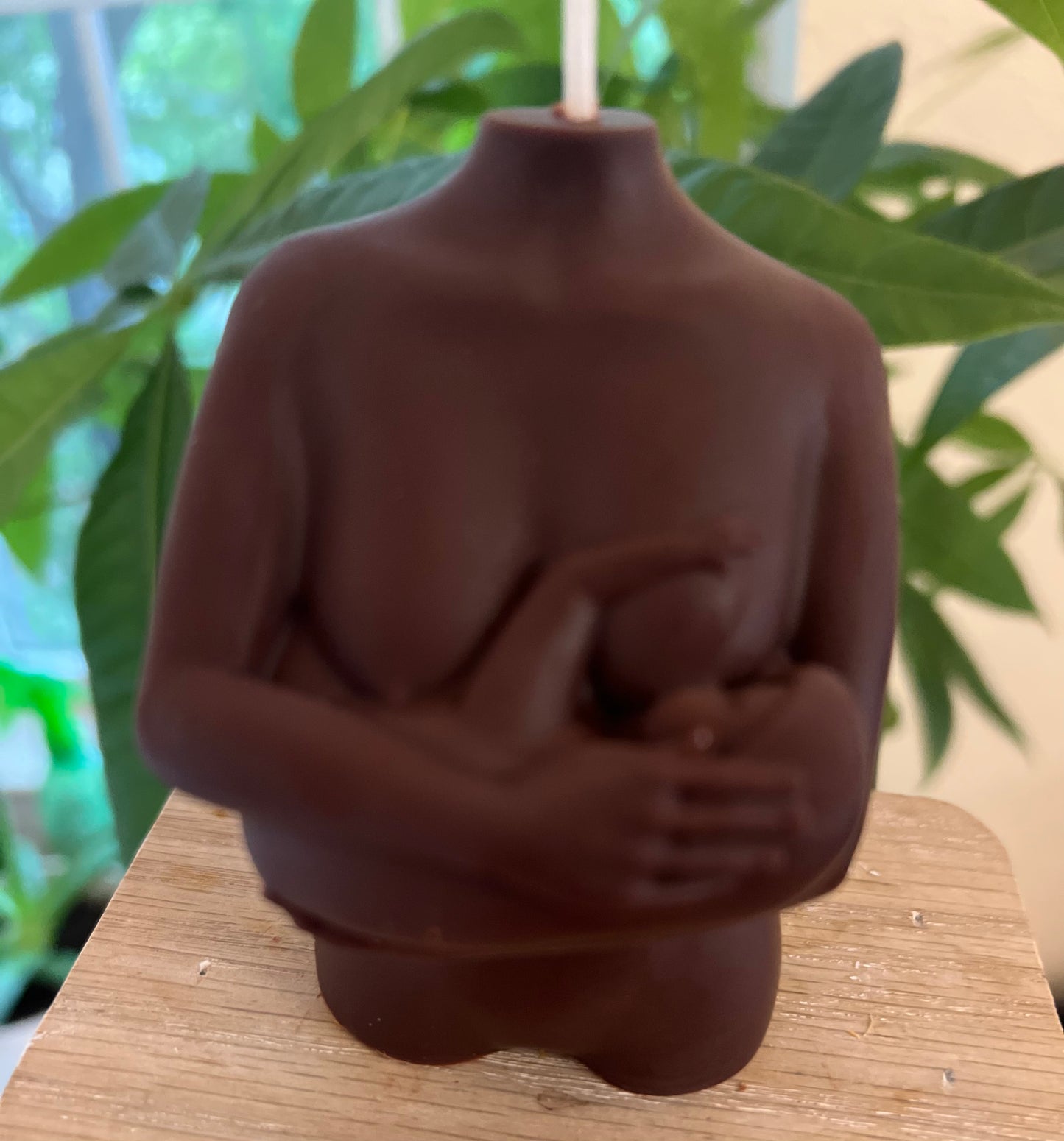 Breastfeeding candle