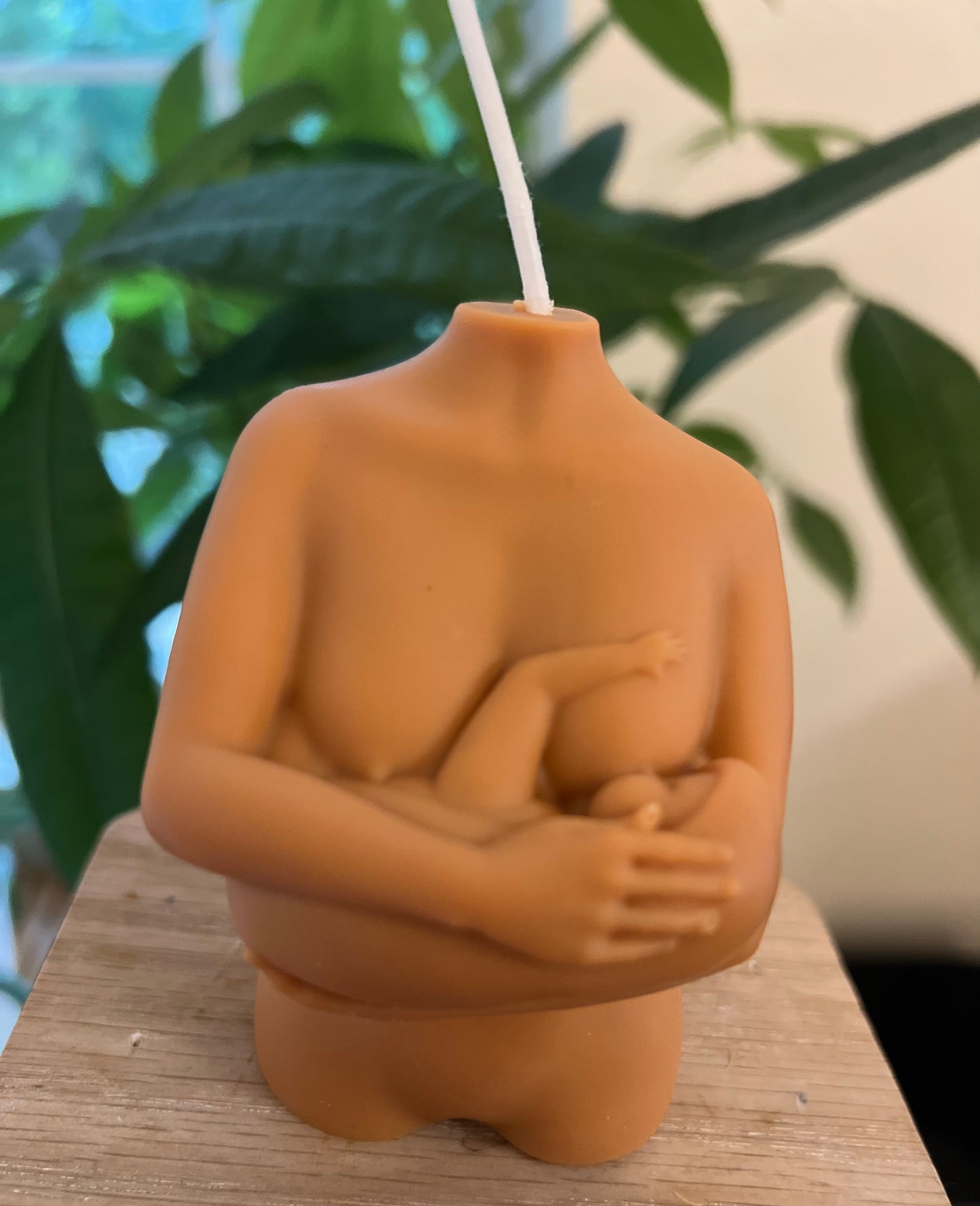 Breastfeeding candle